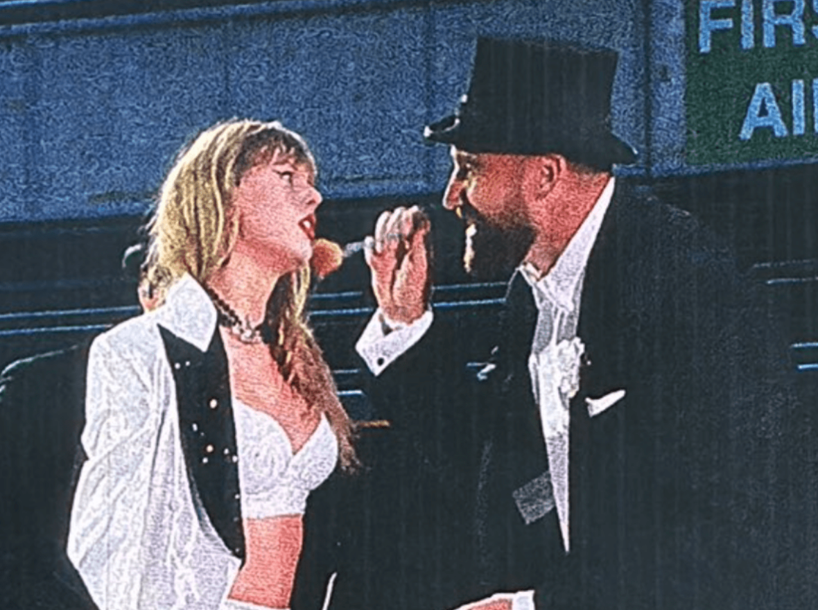Taylor Swift and Travis Kelce on stage during the Eras Tour